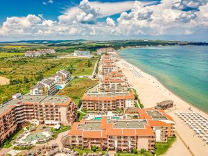 aerial photography of buildings near a beach